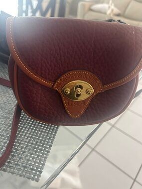 Dooney & Bourke Wine Red Pebbled Leather Crossbody with Tan Trim